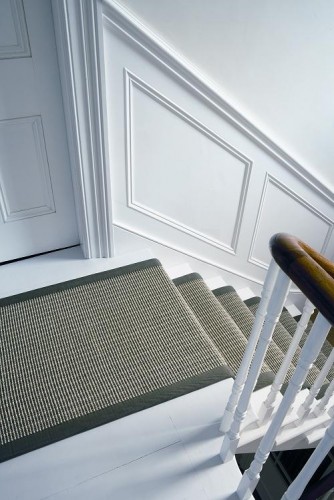 sisal small boucle accents with cotton herringbone border.